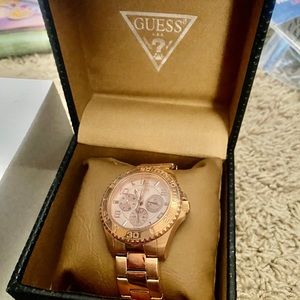 Rose gold guess ladies watch
